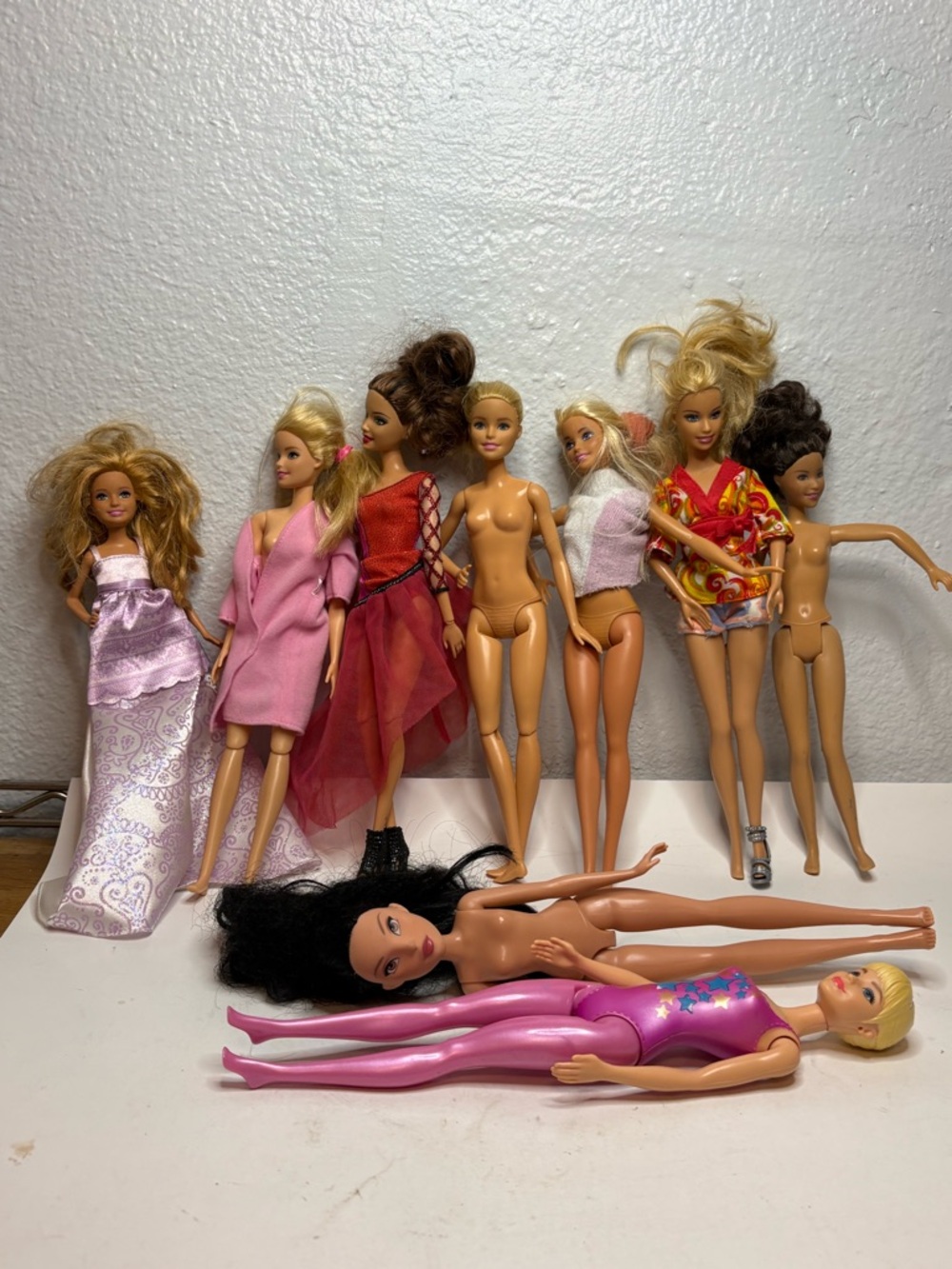 Mixed Doll Lot - Pink, Red, Purple Outfits